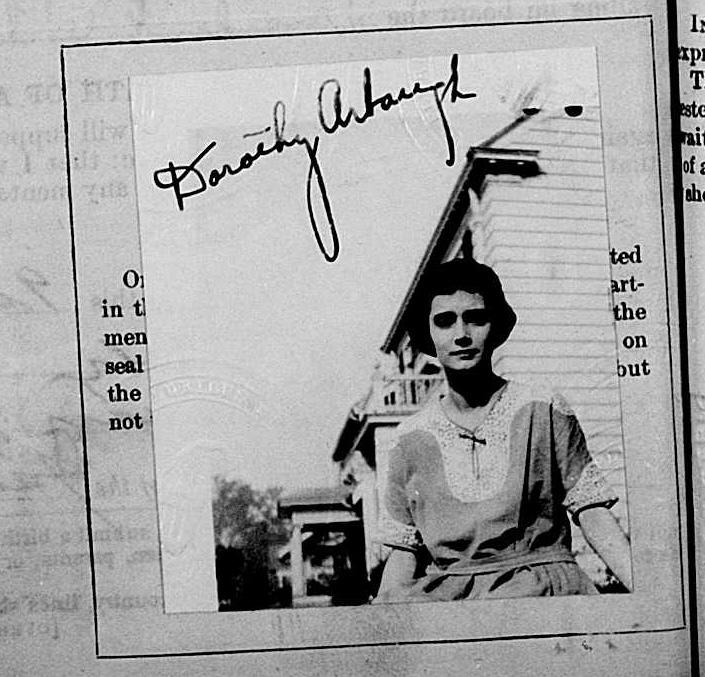 A black and white passport photo of Dorothy Arbaugh with her signature scrawled on top