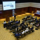 people gather in an event space