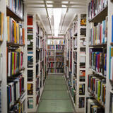 Rows of bookshelves in a library.