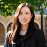 Rebekah stands in the U-M law quad in summer