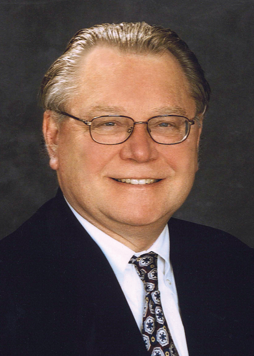 A headshot of Gary M. Olson