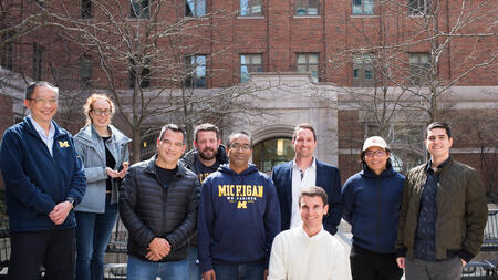 A group of MADS students standing together outside of North Quad