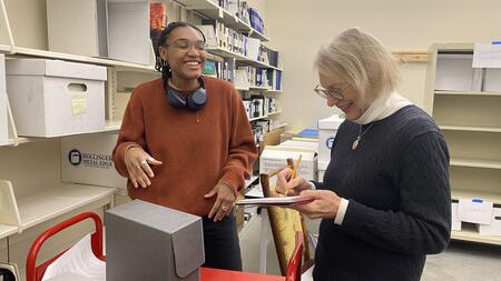 Jordan Rhym (MSI '25) collaborates with professor Elizabeth Yakel during their archives blitz. (Photo by Nadiri Saunders) 