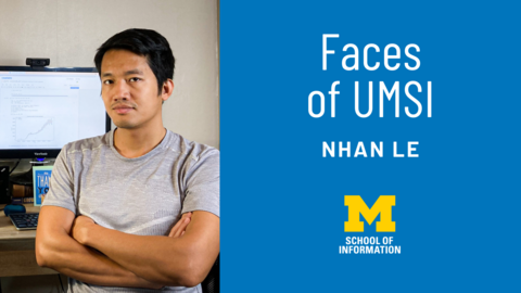 Nhan Le in front of a desktop computer. "Faces of UMSI: Nhan Le"