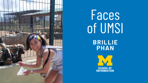 Brillie Phan crouching next to goats behind a fence. "Faces of UMSI: Brillie Phan"