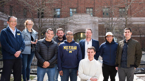 A group of MADS students standing together outside of North Quad