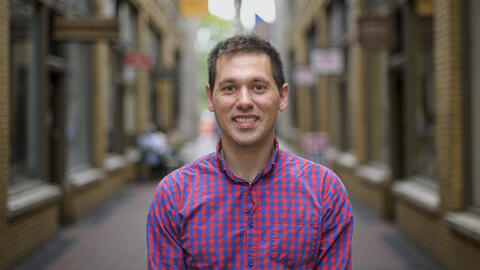 A headshot of Stephen Ontko in the Arcade in Ann Arbor