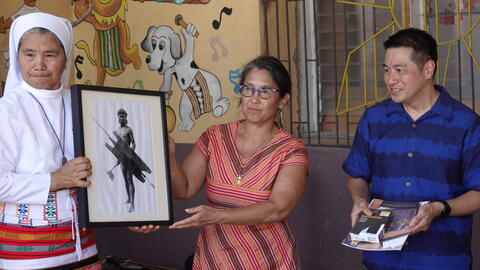 ReConnect/ReCollect co-directors, de la Cruz and Punzalan leading the turn over of select photographic prints and digital files of U-M materials from the BHL and UMMAA collections to Sister Gabriela Dangiwan, curator of the Bontoc Museum