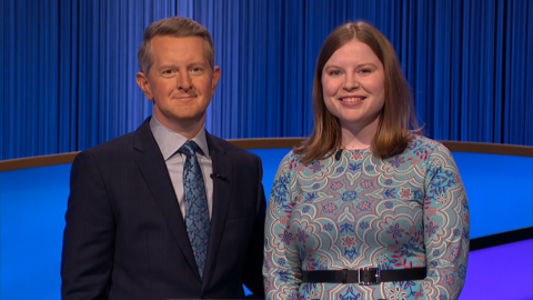 A photo of Adriana Harmeyer posing with Jeopardy! host Ken Jennings