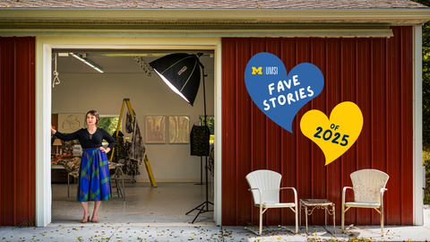 "Fave stories of 2025" written across a blue and a yellow heart, overlaid on a portrait of Sophia Brueckner standing in the large doorway of a red metal barn with studio equipment behind her