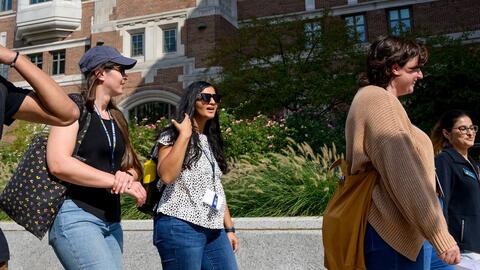 Students walk past north quad