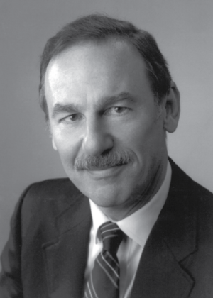 A headshot of Richard M. Dougherty