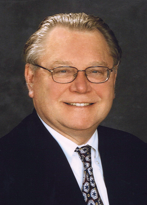 A headshot of Gary M. Olson
