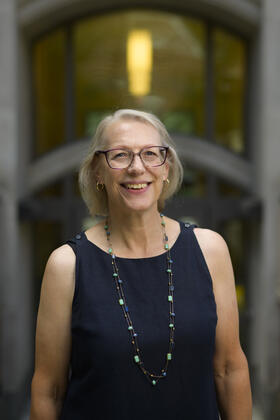 Elizabeth Yakel stands in the NQ courtyard