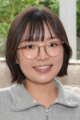 A headshot of Lotus Zhang